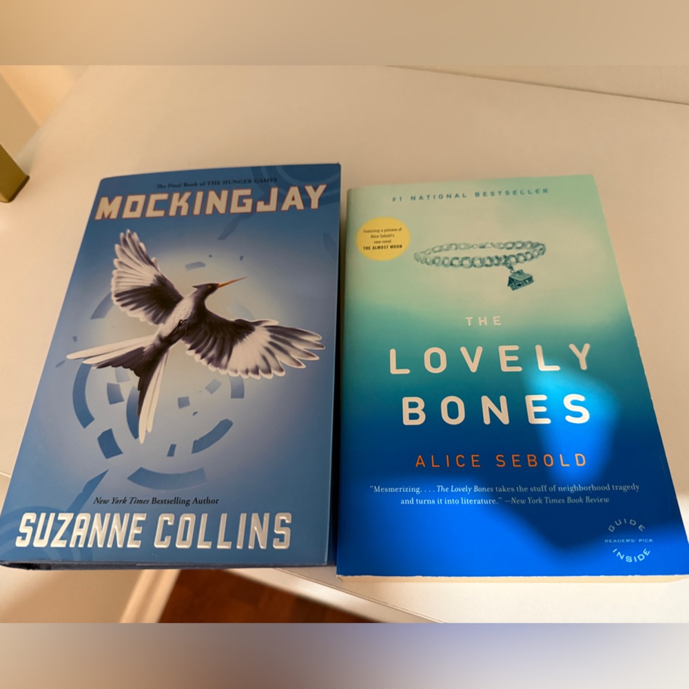 New: Mockingjay by Suzanne Collins + The Lovely Bones by Alice Sebold